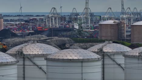 large liquid storage tanks at port of maasvlakte, netherlands