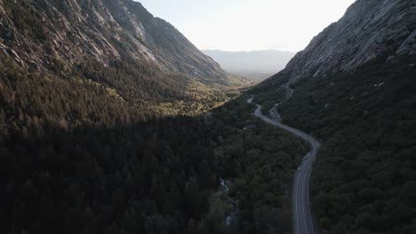 Pulling-out-shot-revealing-the-vastness-of-Little-Cottonwood-Canyon-Utah-while-during-sunset