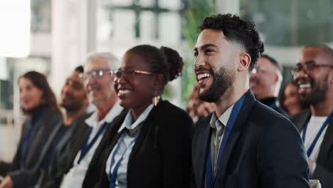 diverse group of businesspeople applauding at a conference