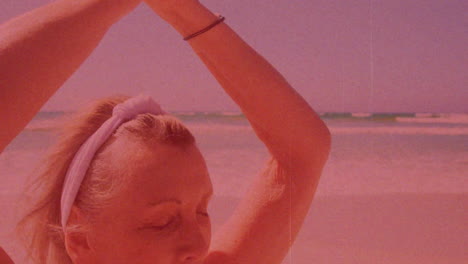 practicing yoga on beach, woman stretching arms over pink animation