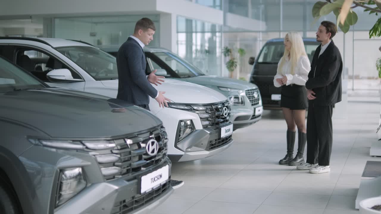 Car Dealership Showroom with Salesman and Customers