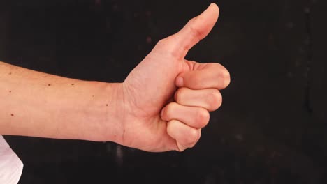 hand showing thumbs up