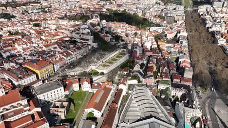 drone flying over lisbon at rossio, with view over avinida liberdade and principe real