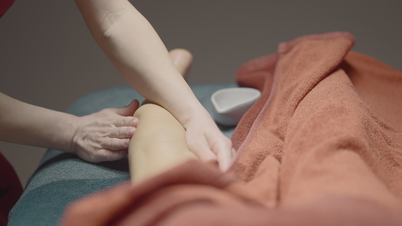Seduta di massaggio alle gambe