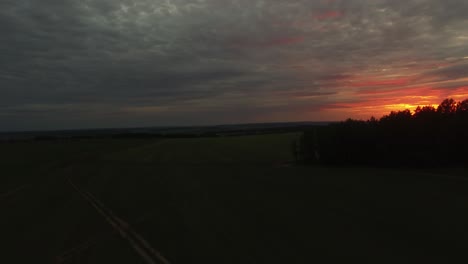 sunset over countryside fields