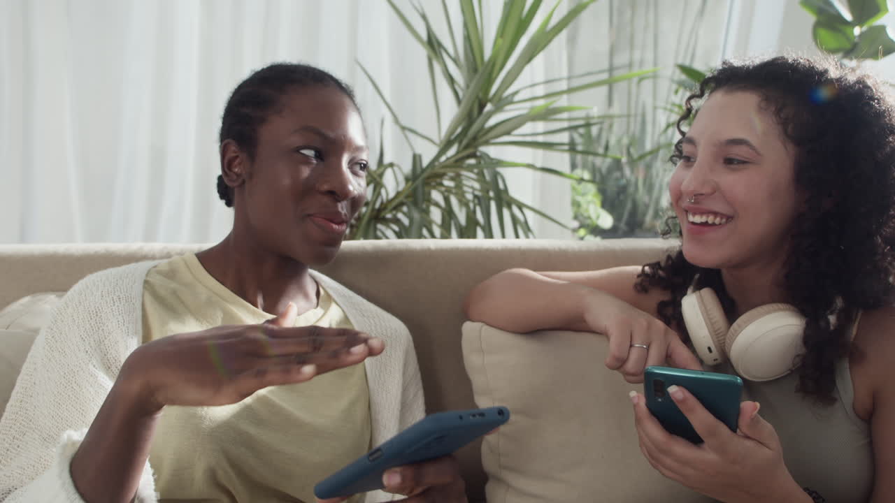 Girlfriends Gossiping Using Smartphones at Home