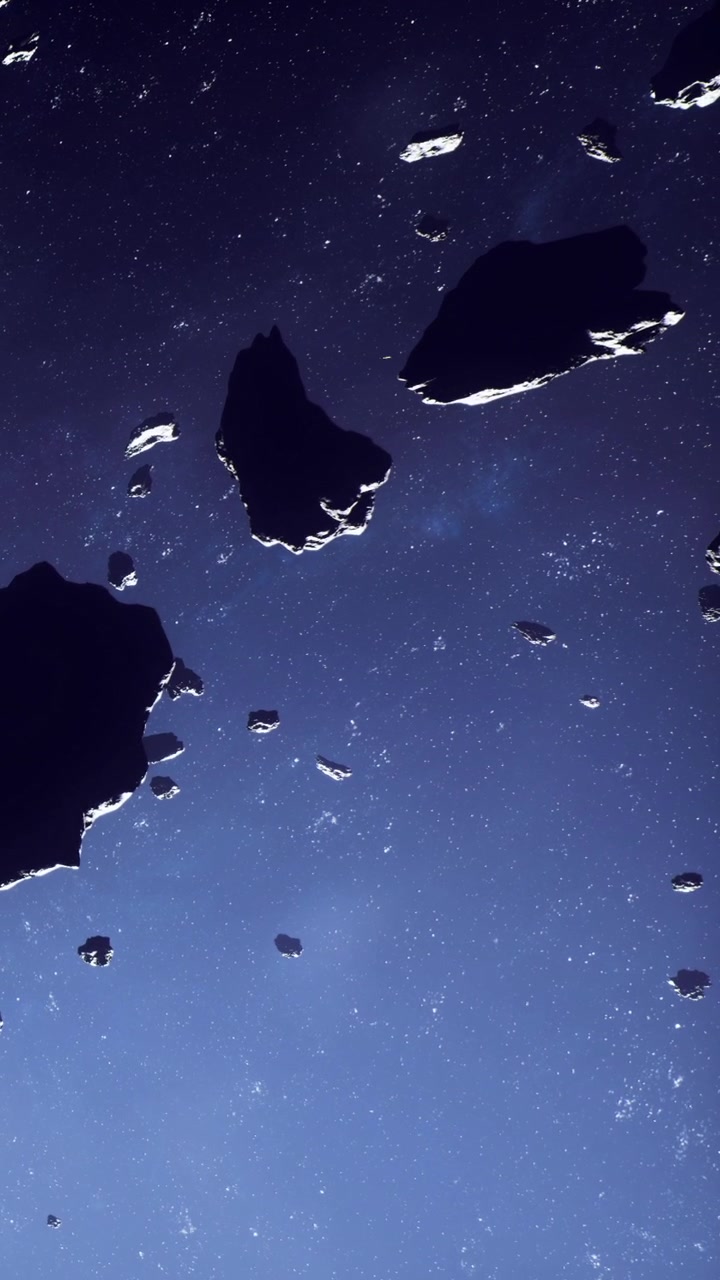Asteroids floating in space with stars and dark sky in the background