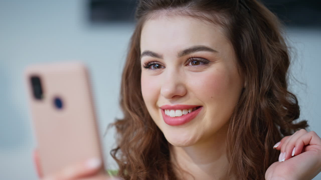 Lady finger tapping smartphone grey colours interior closeup. Manager rejoicing