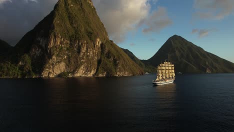 saint lucia's beautiful coast, with the royal clipper cruise ship passing by