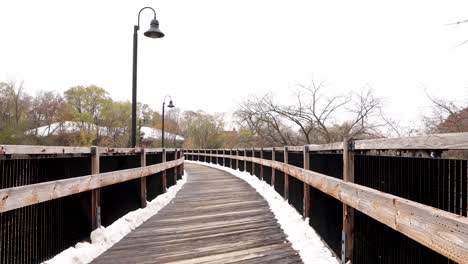 wooden trail covered in snow