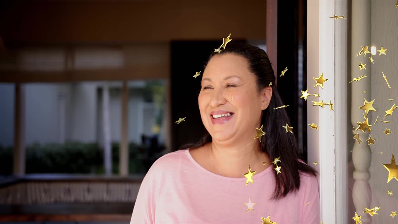 Mature woman laughing in doorway, golden stars appearing from right and eliciting joy for marketing