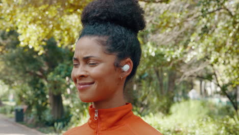 woman enjoying music outdoors