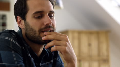 Thoughtful-man-sitting-alone