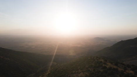 Stunning-sunset-aerial-in-an-mountain-dessert