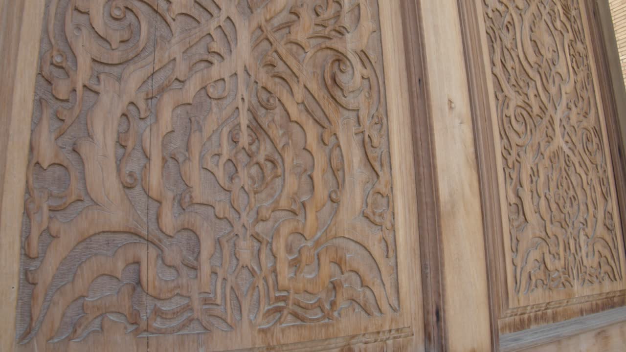 Gate carved wood pattern at Muslim religious complex, mausoleum Hazrati Imam in Tashkent, Uzbekistan