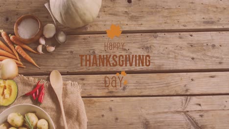 Animation-of-happy-thanksgiving-day-text-over-vegetables