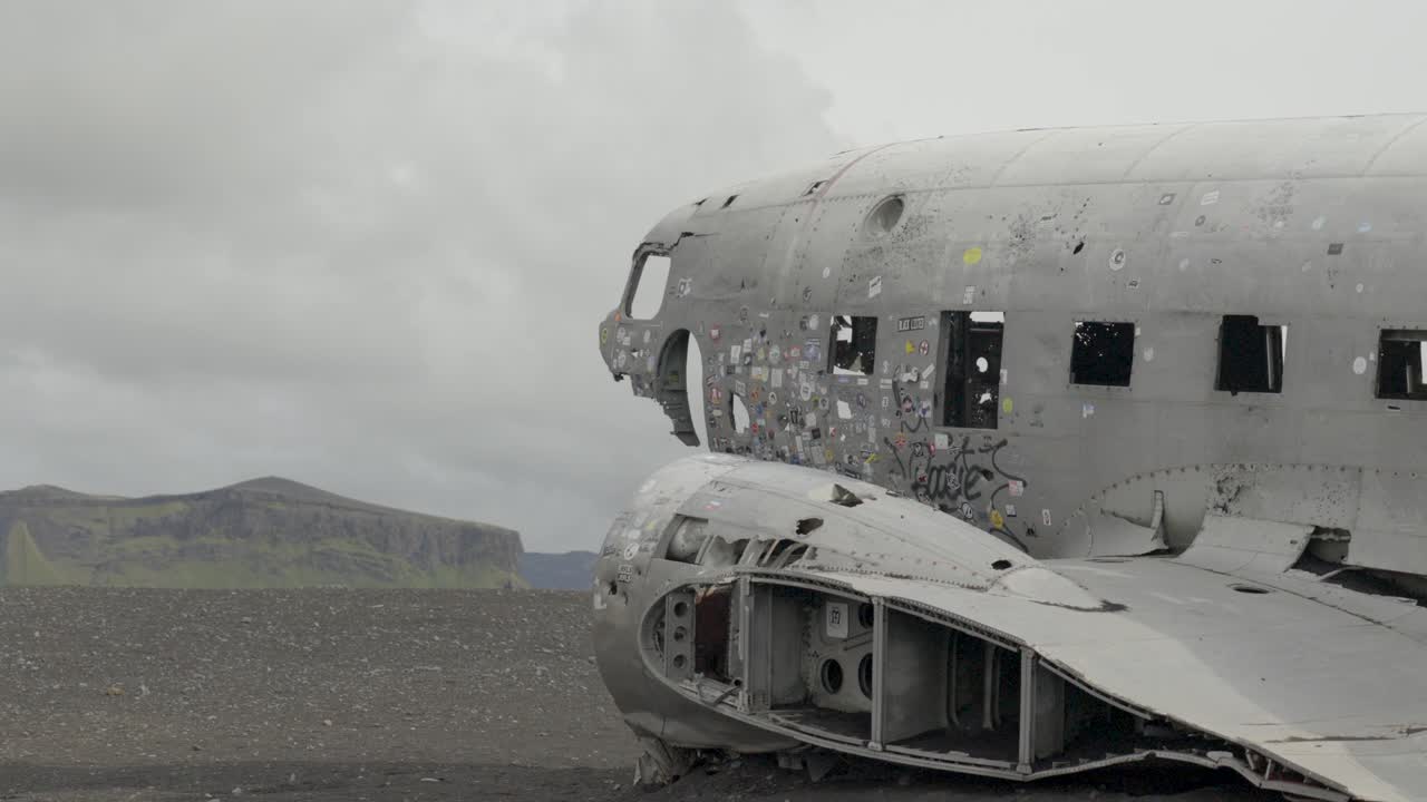 Hand-held shot of the S&oacute;lheimasandur DC3 plane crash on the shore of Iceland