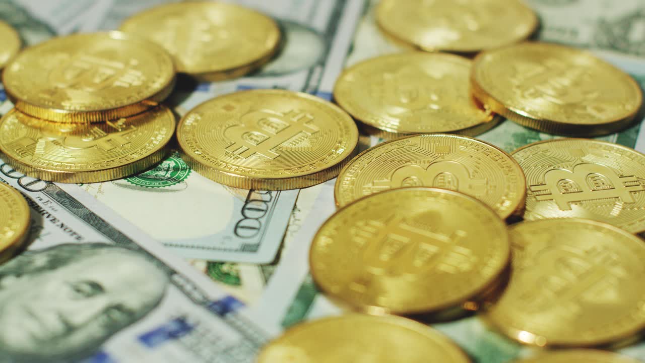 Bright gold bitcoins with dollars