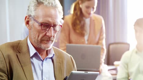 businessman using digital tablet