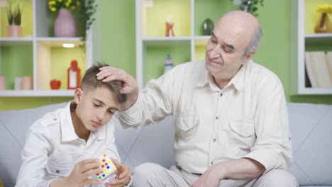 the grandfather who looks at his grandchild and goes back to the past. grandpa gets emotional.