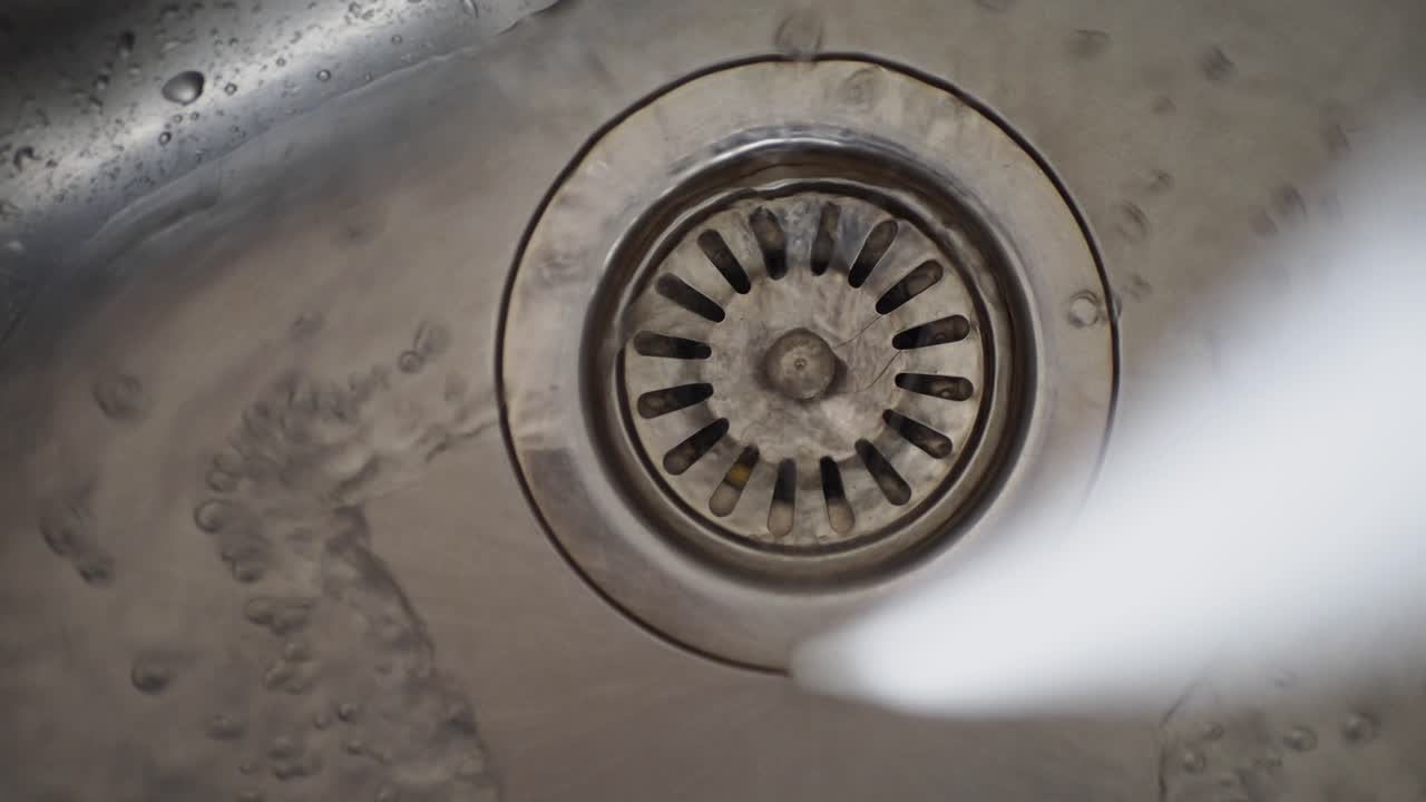 Kitchen Sink Drain with Water