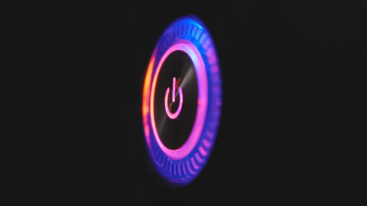 loop video macro 4k di un pulsante di accensione del computer su un'unità di sistema su uno sfondo nero.