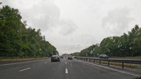 cars driving on a rainy highway in birmingham