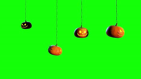 halloween holiday. scary pumpkins glow from the inside. green screen for keying.