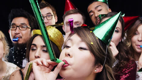 multi-ethnic group of people celebrating birthday party slow motion photo booth