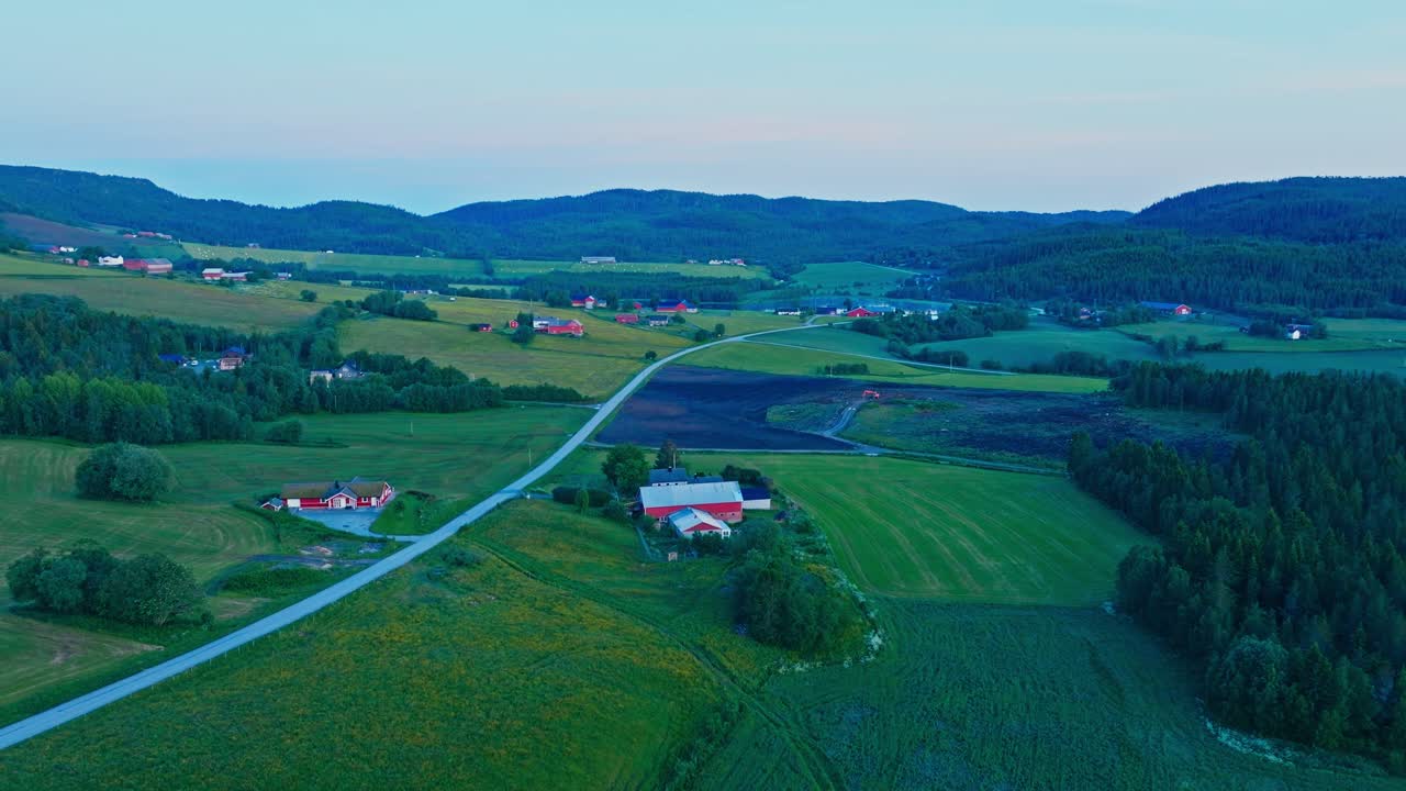 Panoramic View Of Rural Landscape With Village And Green Fields In Norway - Drone Shot
