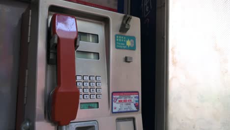 A-public-telephone-booth-also-called-a-payphone