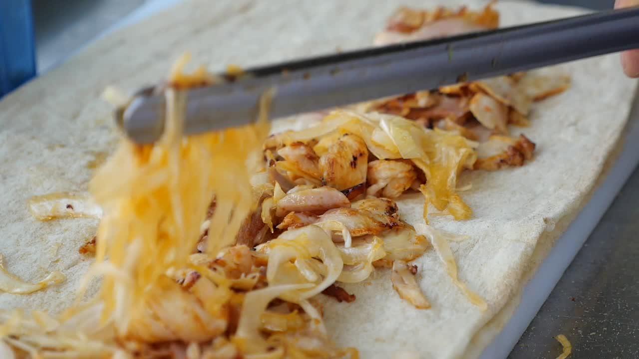 Preparing a Chicken and Onion Wrap