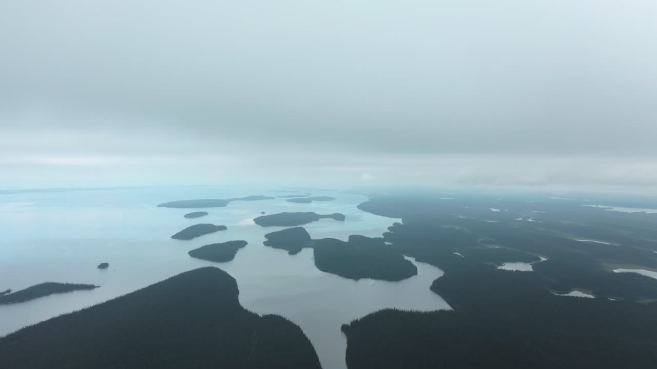 Aerial view of an immense lake on a cloudy day