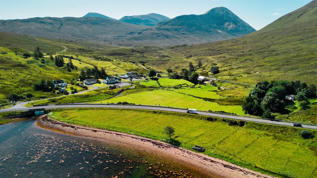 Scenic Landscape with Mountains, Lake, and Road