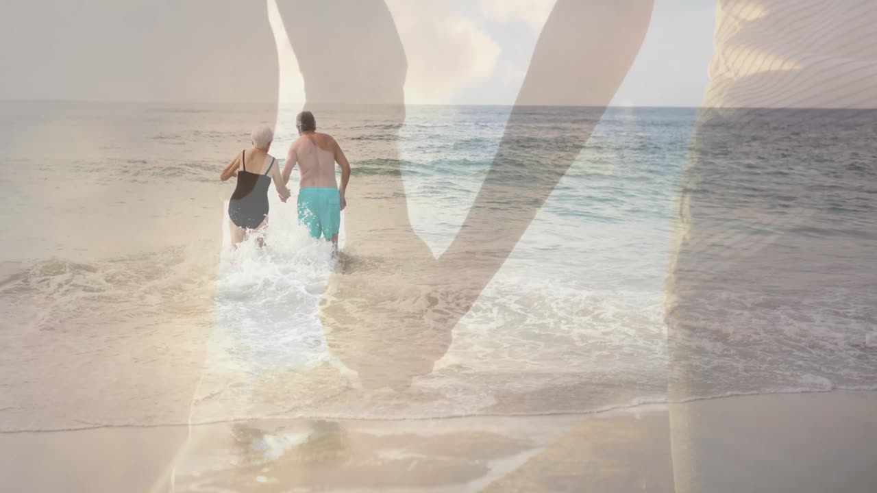 animación de una pareja de ancianos caucásicos tomados de la mano en la playa