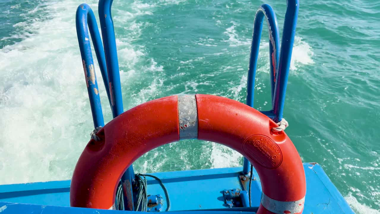 Life preserver on a boat in the ocean