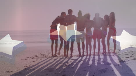 animación de la bandera estadounidense sobre un grupo diverso de amigos abrazándose en la playa