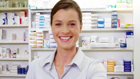 Pharmacist-checking-a-medicine-in-pharmacy
