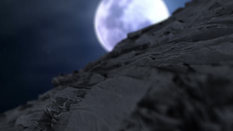 moon on a cliff rocks