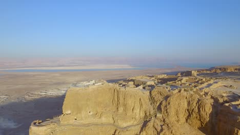 passing over masada mountain towards the dead sea