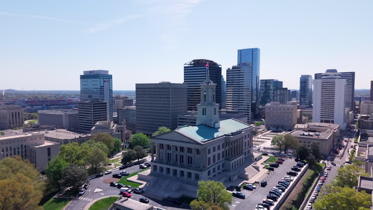 State Capitol Building on Capitol Hill in central Nashville, Tennessee - rising aerial reveal on a sunny day
