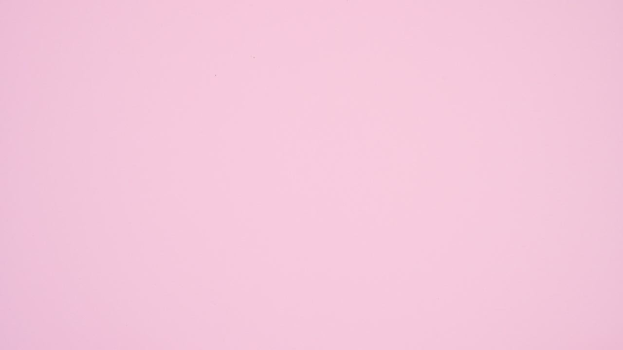 Love wooden letters come out from pink gift on pastel pink theme. Stop motion