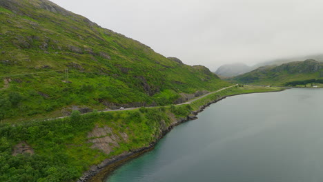 Steep-Mountains-With-Country-Road-In-Islendingen,-Lofoten-Island,-Norway