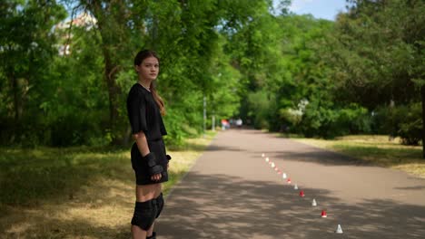 teenager rollerblading in a park