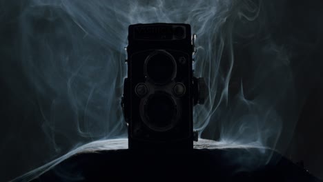 white smoke on a vintage twin lens camera - 02