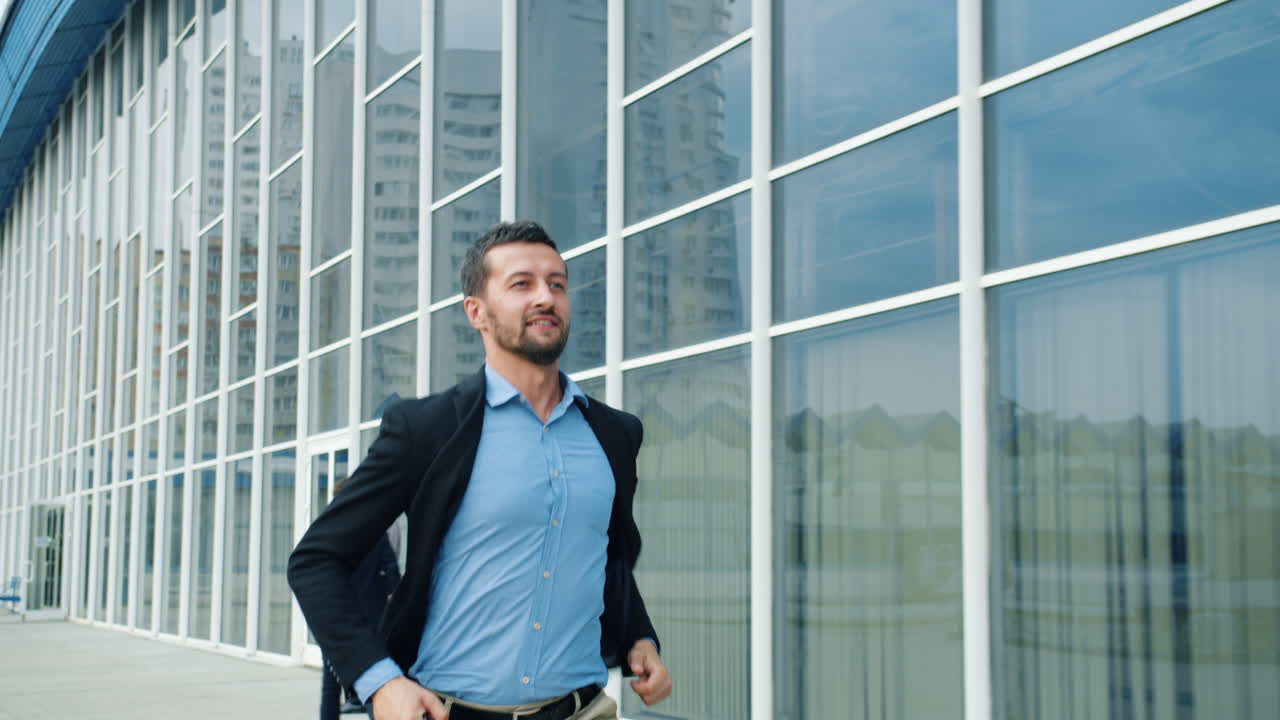 Businessman Running Outside of Office Building