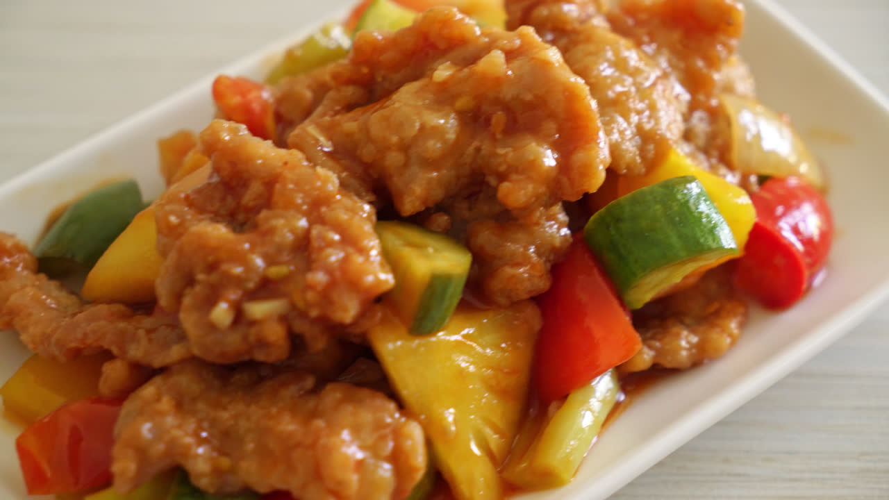 Stir fried sweet and sour sauce with pork and vegetable