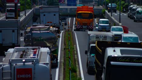 a timelapse of the traffic jam at the urban street in tokyo long shot