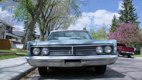 vintage car blue mercury front tilt