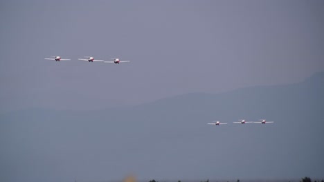 rear view of formation flight of snowbirds jet demonstration team
